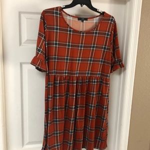 A long, brown plaid tunic top or mini dress.